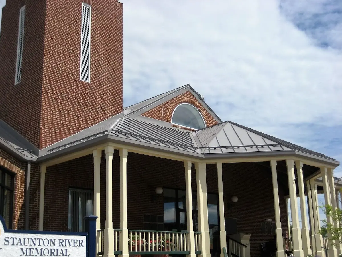 Skilled roofing craftsmen working on a residential roof in Gayville